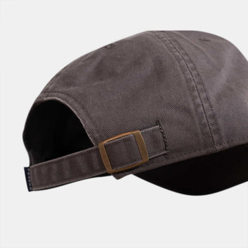 brass clasp on back of dad hat