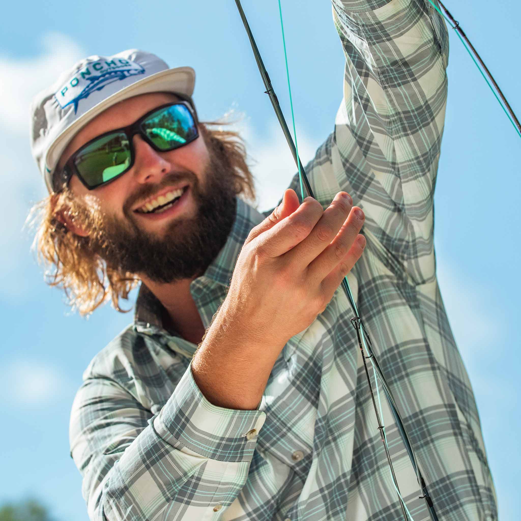 closeup of guy with fishing rod