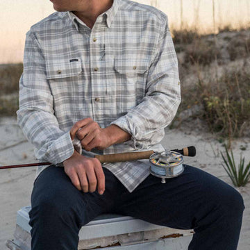 Plaid Snowcat photo of man with fishing rod