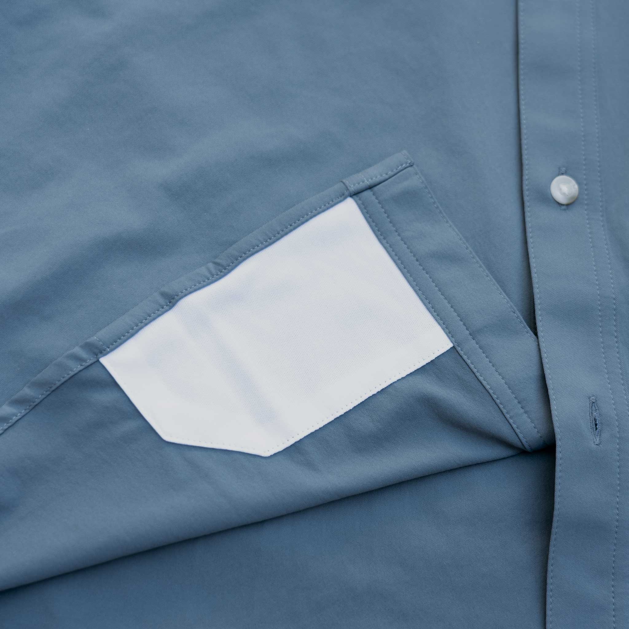 Close up lens of underside of shirt