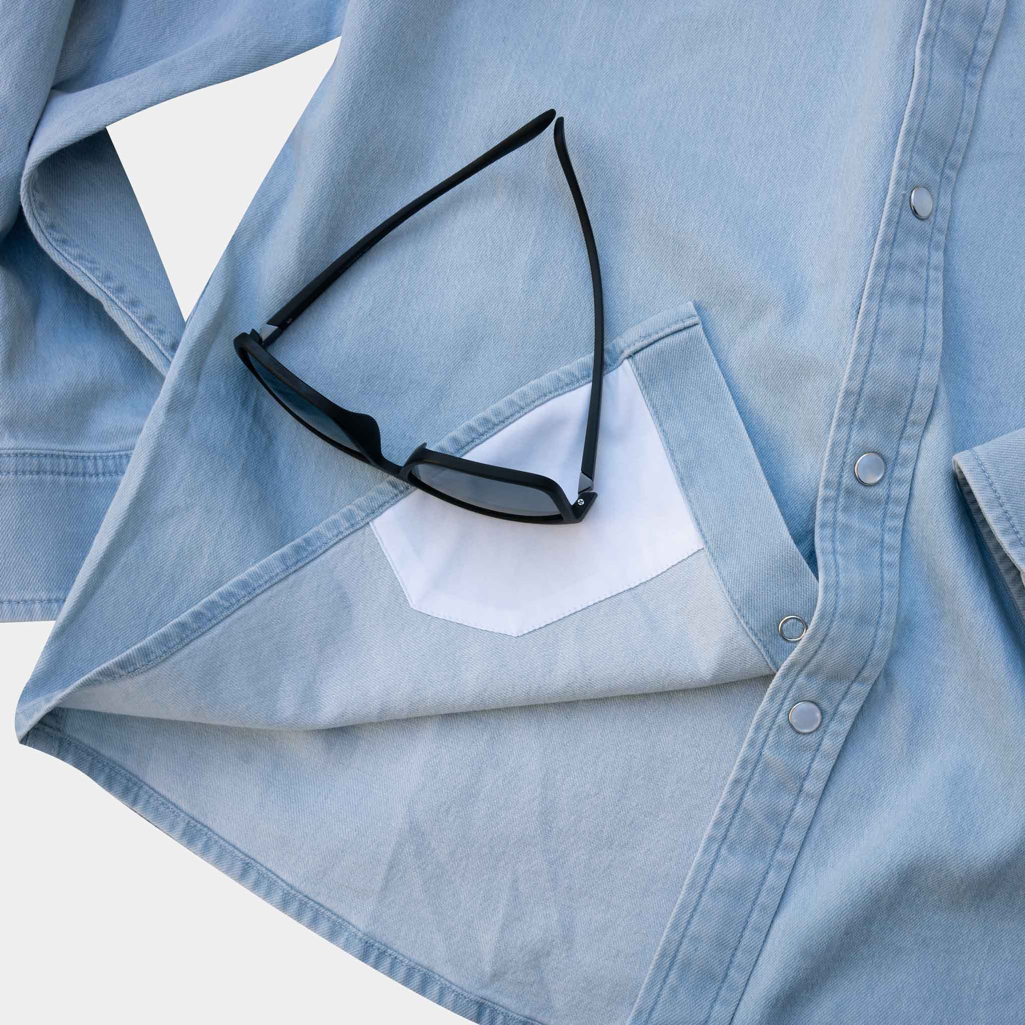 lens cloth on bottom of shirt