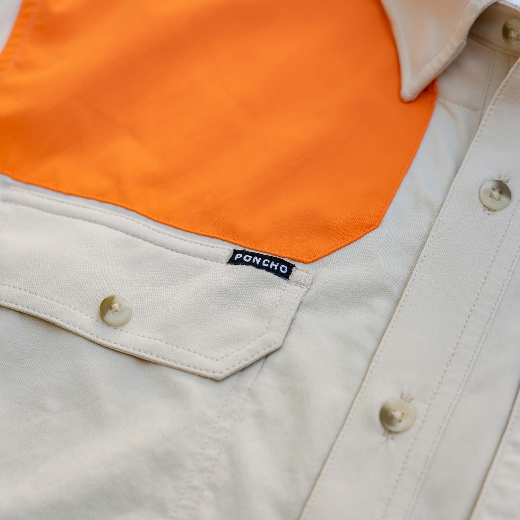 Close up of upper right chest on the long sleeve tan shirt with blaze patch