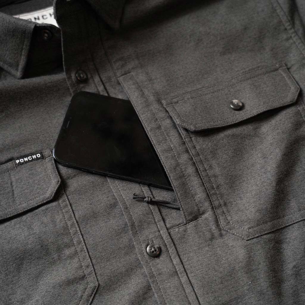Close up of cell phone pocket of shirt 
