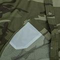 Close up of camo shirt with sunglass cleaner 