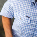 light blue short sleeve fishing shirt pocket close up