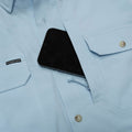 Close up of cell phone pocket with cell phone in pocket