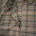 close up of olive flannel shirt